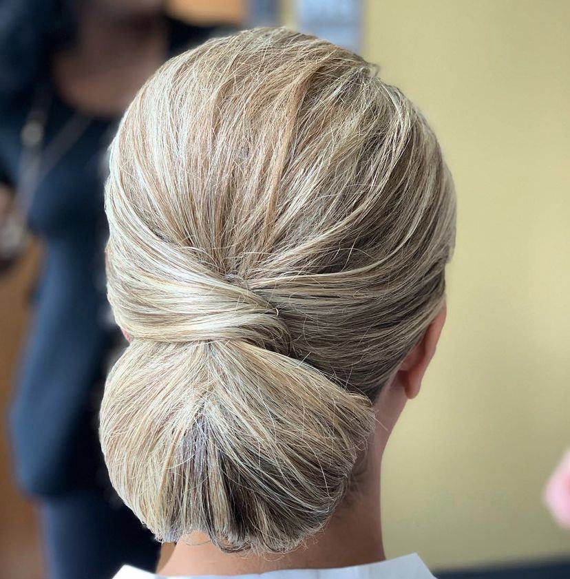 A blonde twisted low chignon